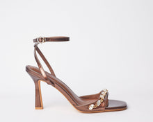 Load image into Gallery viewer, AMOKUA - bronze classy sandal heels. Very stylish. has crystal accessories. Perfect for parties, classy girls night out and celebrations. Shipping worldwide from Ghana to UK, USA, AFRICA ETC.
AMOKUA - gold classy sandal heels. Very stylish. has crystal accessories. Perfect for parties, classy girls night out and celebrations. Shipping worldwide from Ghana to UK, USA, AFRICA ETC.
