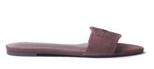 Load image into Gallery viewer, A single women's flat slide sandal in a dusty rose-brown suede-like material, featuring a wide strap embellished with small metallic studs, shown in profile against a white background.